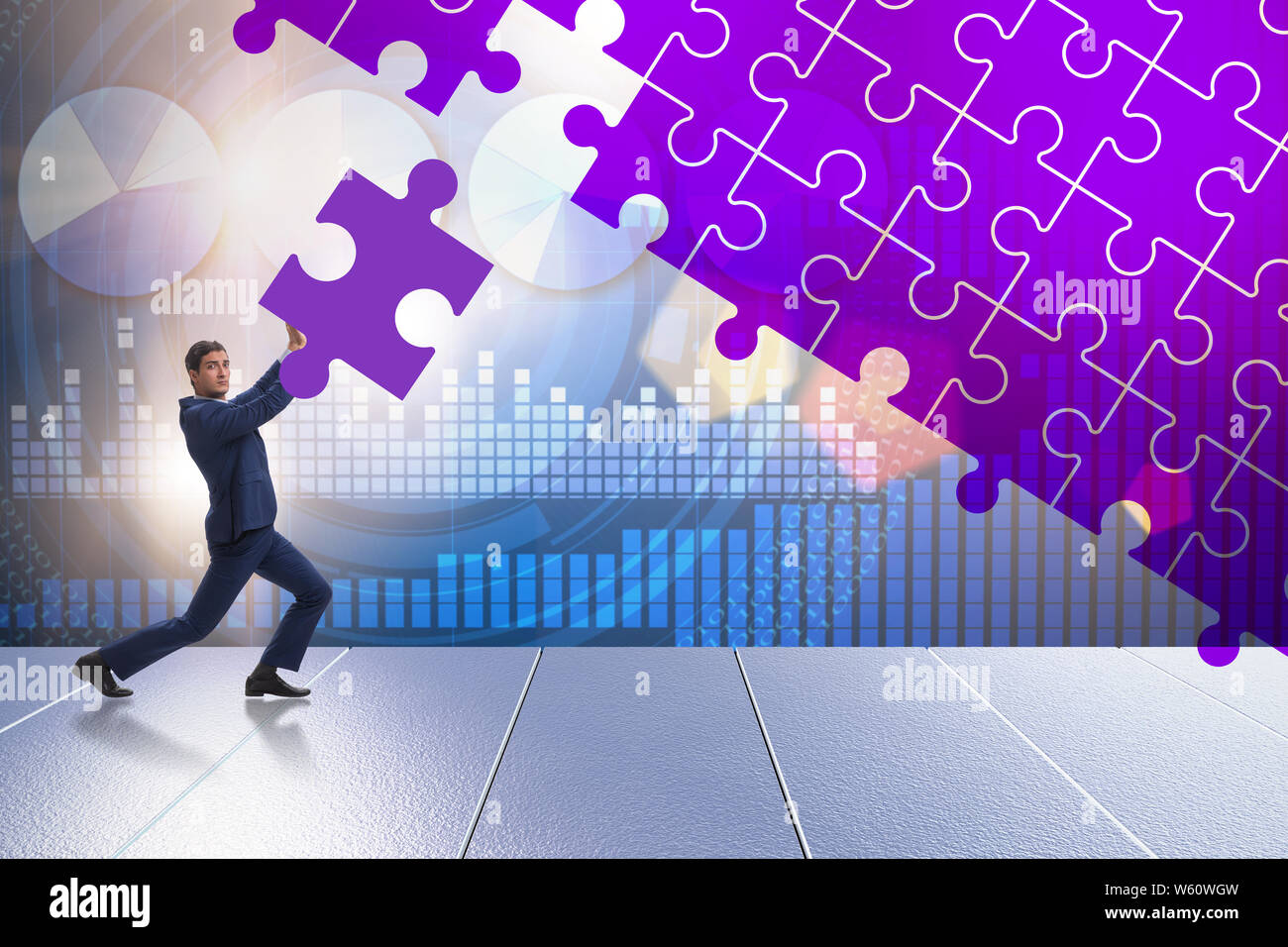 The concept of businessman with missing jigsaw puzzle piece Stock Photo ...