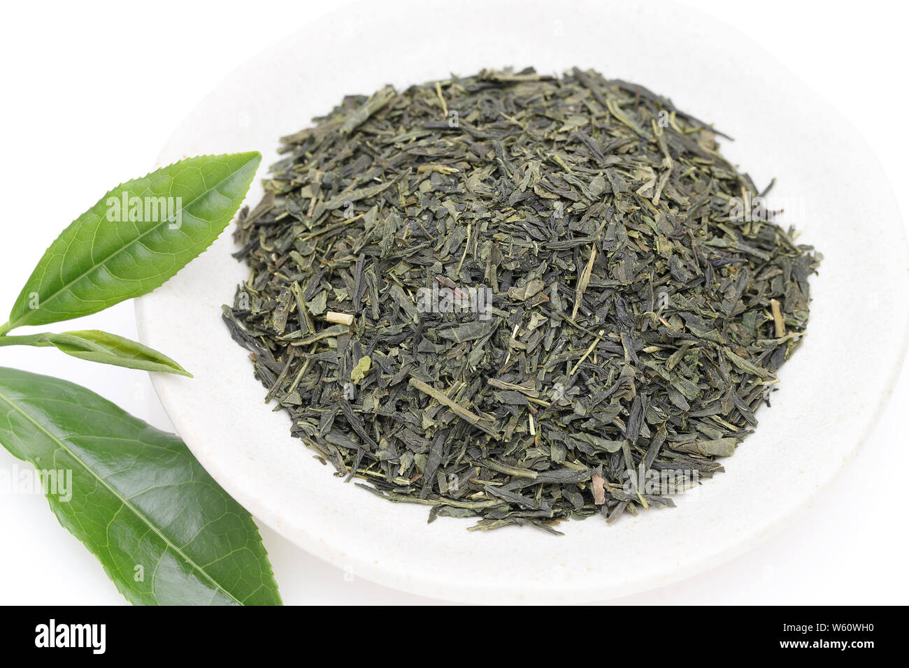 Dried tea leaves with green tea leaves Stock Photo Alamy