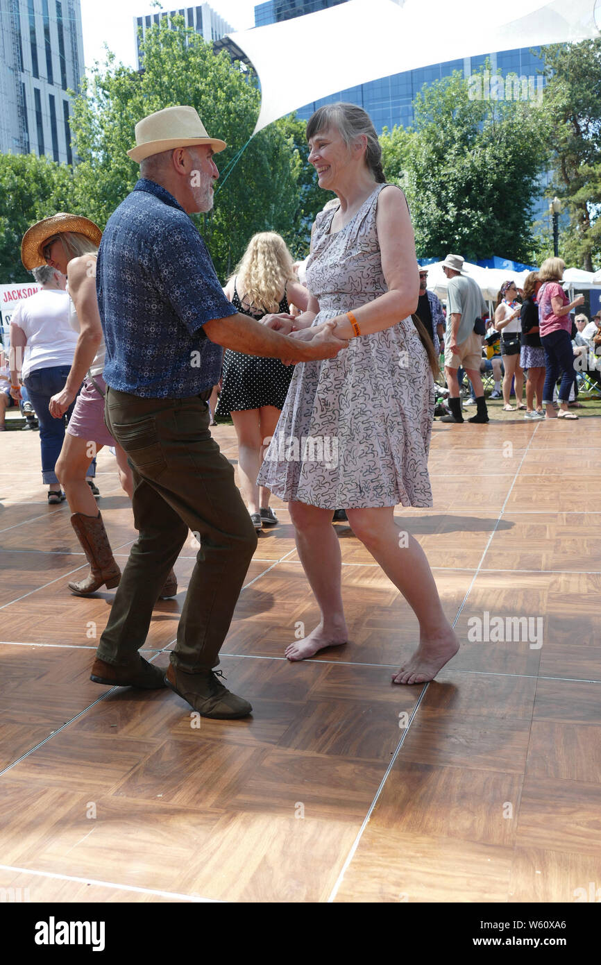PORTLAND, OREGON JUL 4, 2019 Dancers enjoy cajun zydeco music at