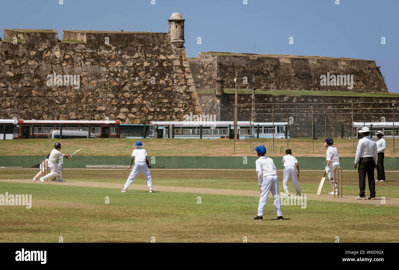 Galle, Sri Lanka - 2019-04-01 - STeenagers Practice Cricket Under League Coach Supervision. Stock Photo