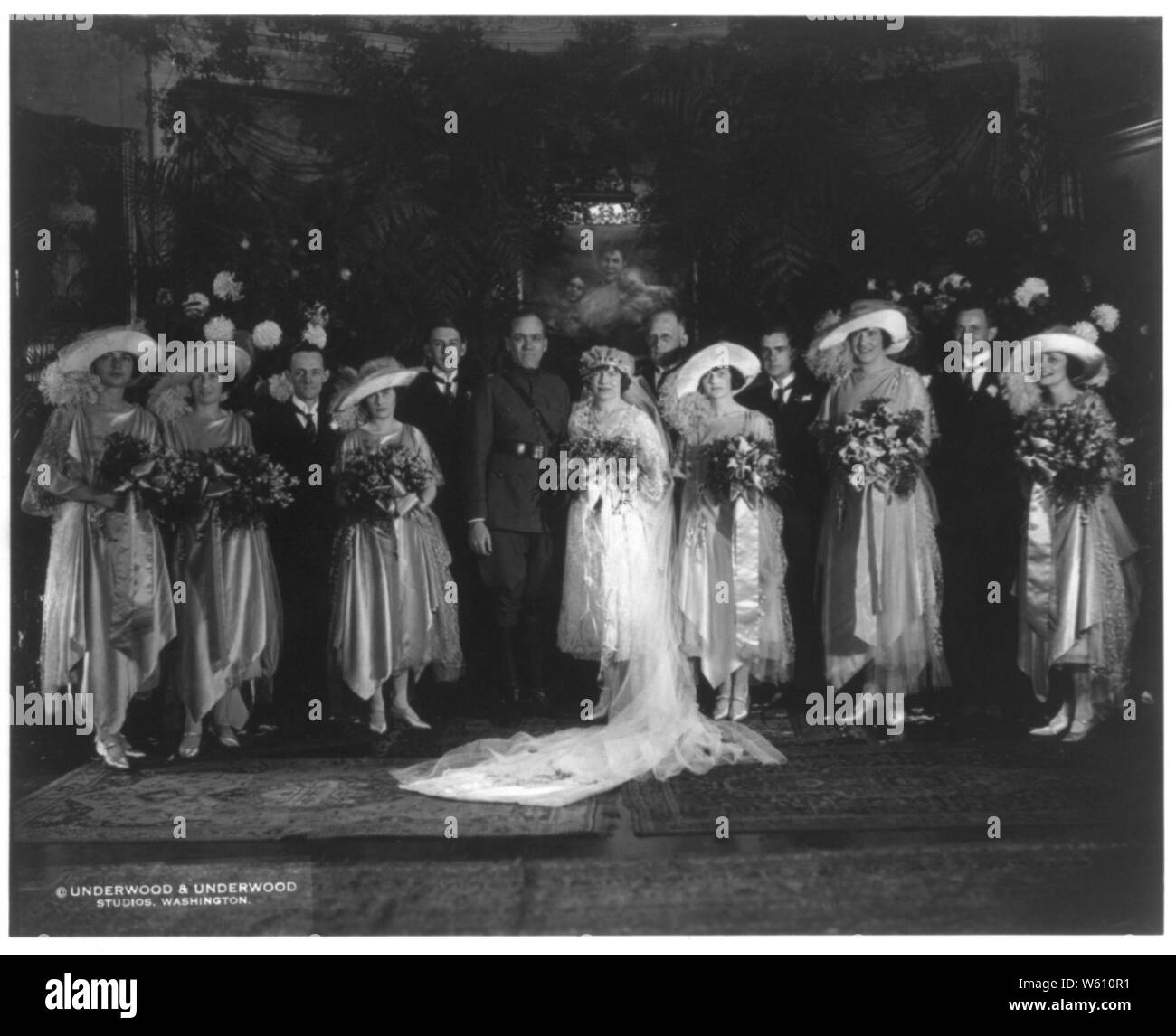 David St. Pierre Gaillard and his wife Mona Blodgett Gaillard. Full-length, standing; with their wedding party Stock Photo