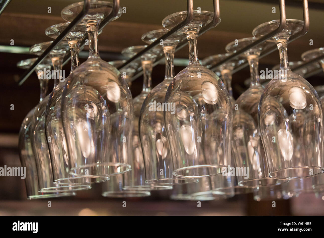 rows of empty cocktail wine glasses Stock Photo