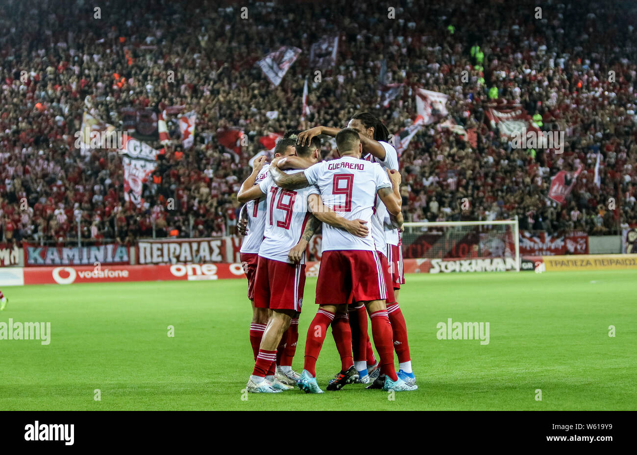 190731) -- PIRAEUS, July 31, 2019 (Xinhua) -- Players of Olympiacos  celebrate after scoring during the second leg of second qualifying round  match of UEFA Champions League between Olympiacos of Greece and