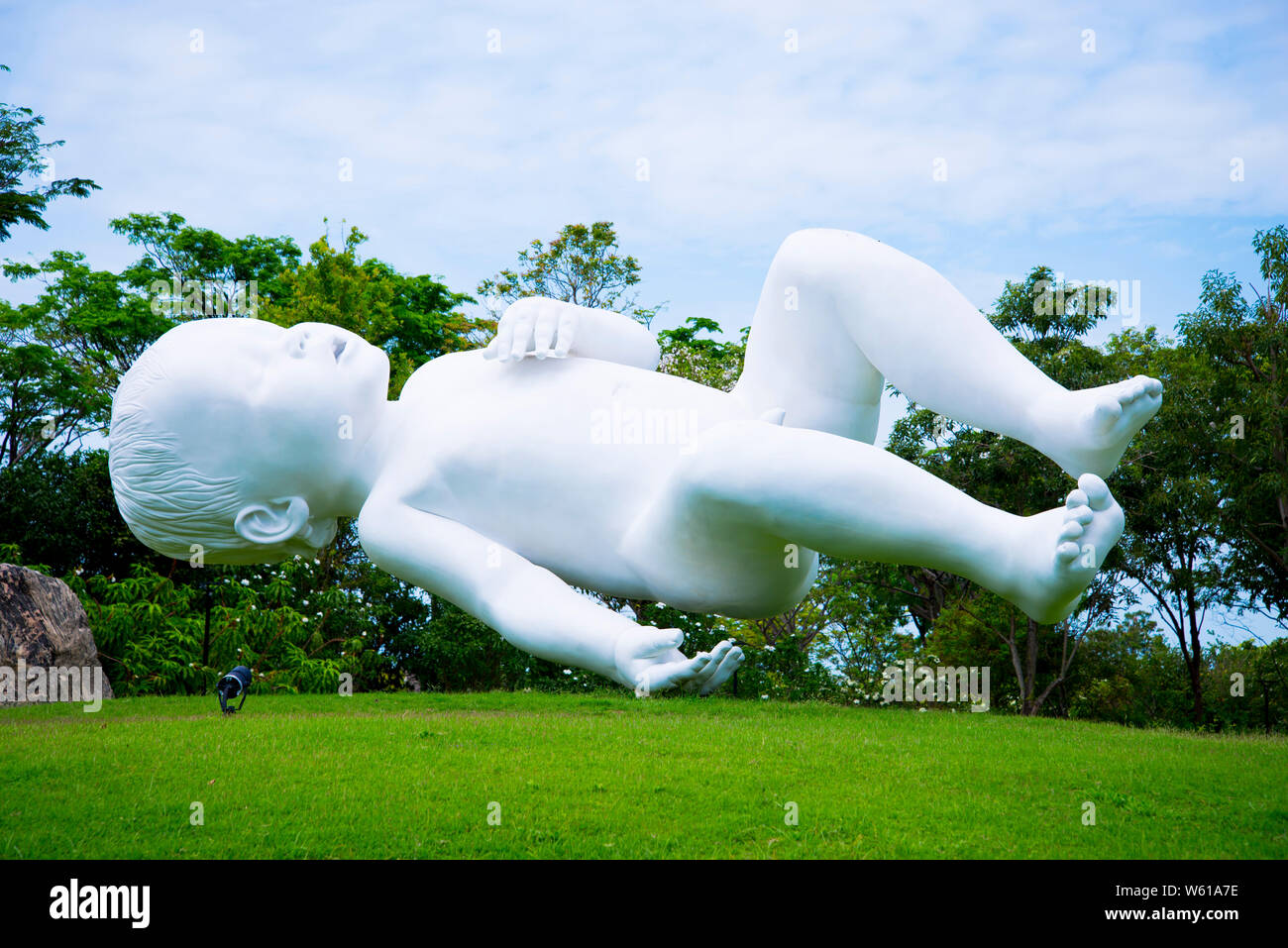 SINGAPORE CITY, SINGAPORE - April 12, 2019: 'Planet' sculpture is an oversized baby floating in the air created by Marc Quinn Stock Photo