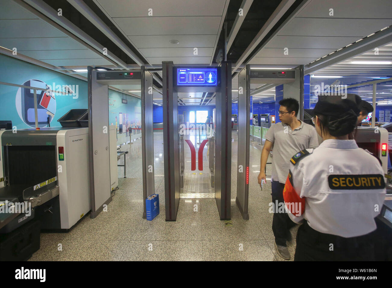 Subway Check In A passenger has his face scanned by a face recognition system to buy ...