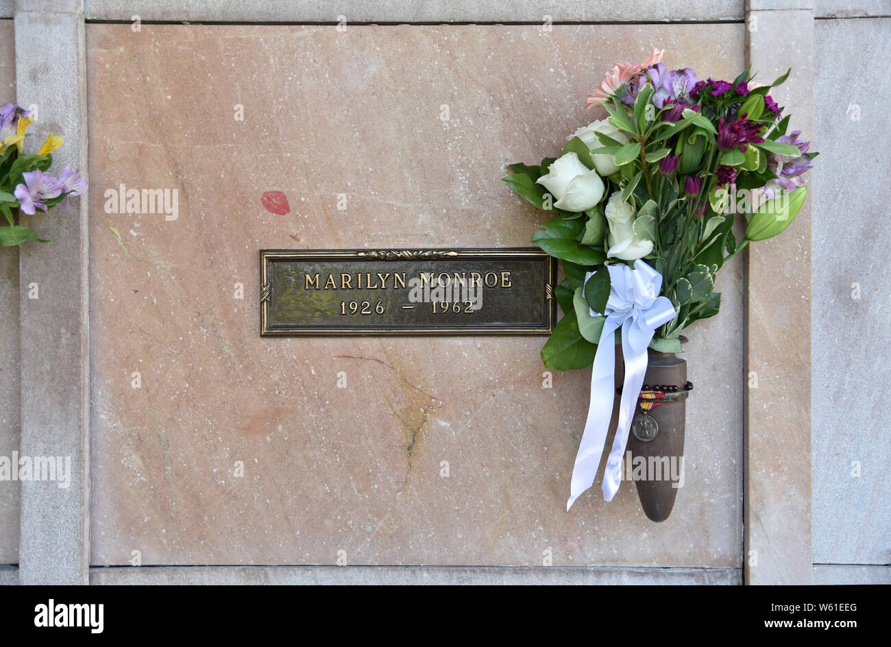 LOS ANGELES, CA/USA - MARCH 15, 2019: Lipstick prints on Marilyn Monore’s Grave at Pierce Brothers Westwood Village Memorial Park, where many celebrit Stock Photo