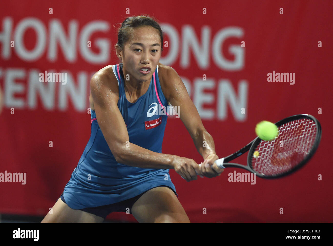 Zhang Shuai of China returns a shot to Sabina Sharipova of Uzbekistan in  their first round match of the women's singles during the WTA Hong Kong  Tenni Stock Photo - Alamy
