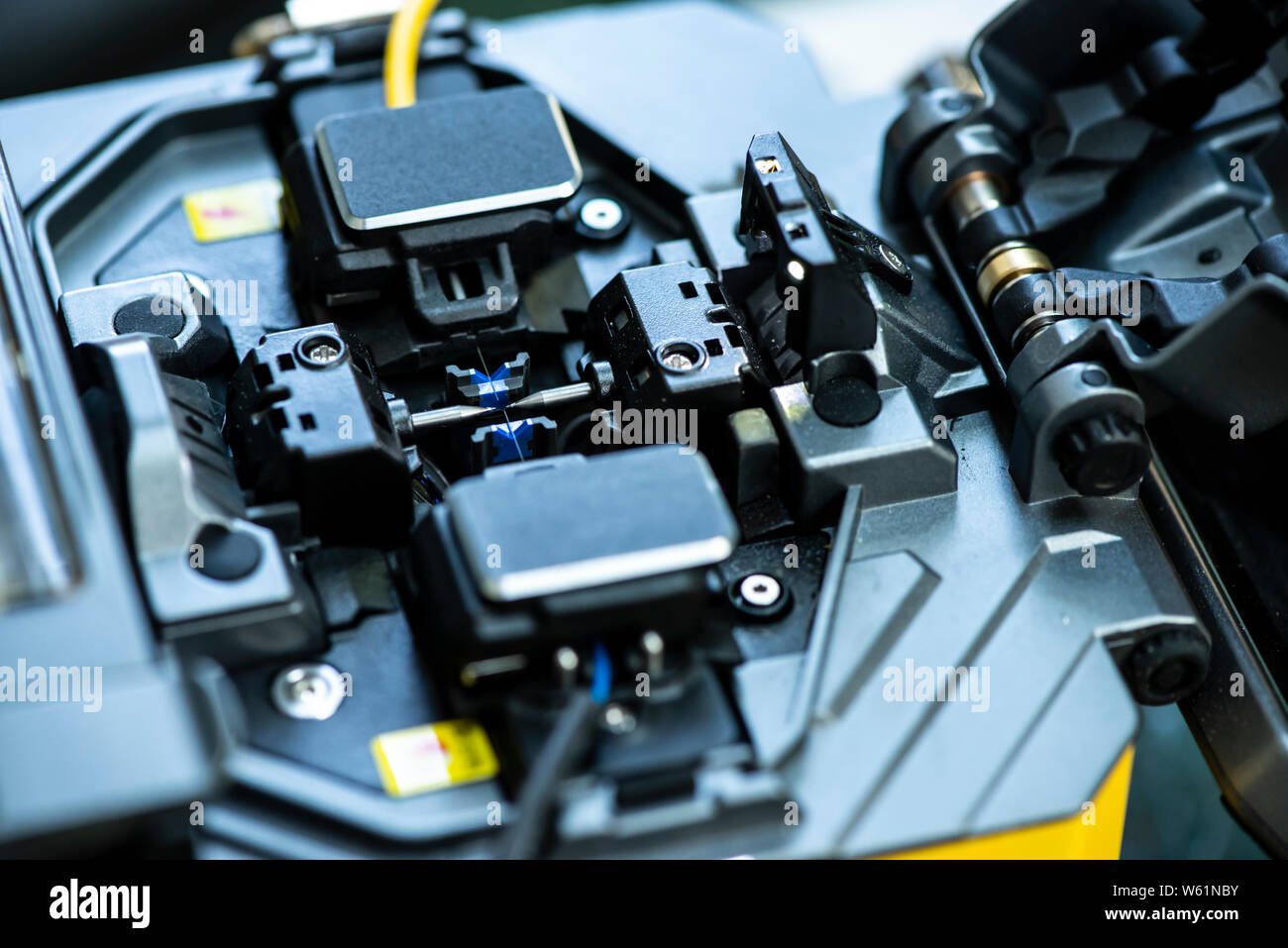 Device for mounting optical cable. Optical Technology concept