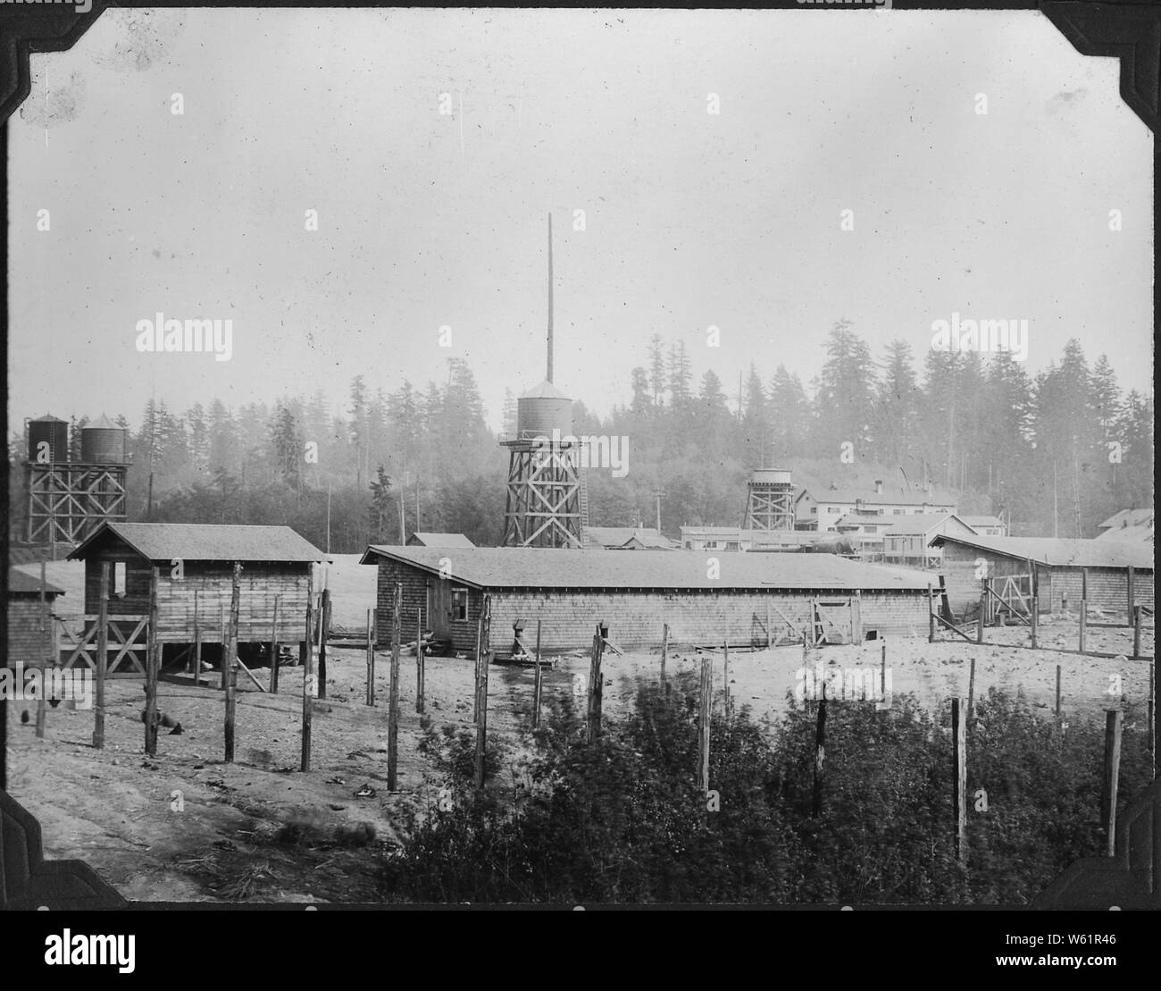 Buildings at farm; Scope and content:  The photos in the collections date from its establishment as a Federal prison located on an island in Puget Sound. Stock Photo