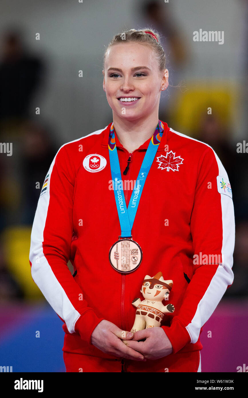 July 30, 2019: Ellie Black (#13) of Canada on the podium after winning the gold medal in the uneven bars final at the Pan American Games Artistic Gymnastics Apparatus Finals at Polideportivo Villa el Salvador in Lima, Peru Daniel Lea/CSM Stock Photo
