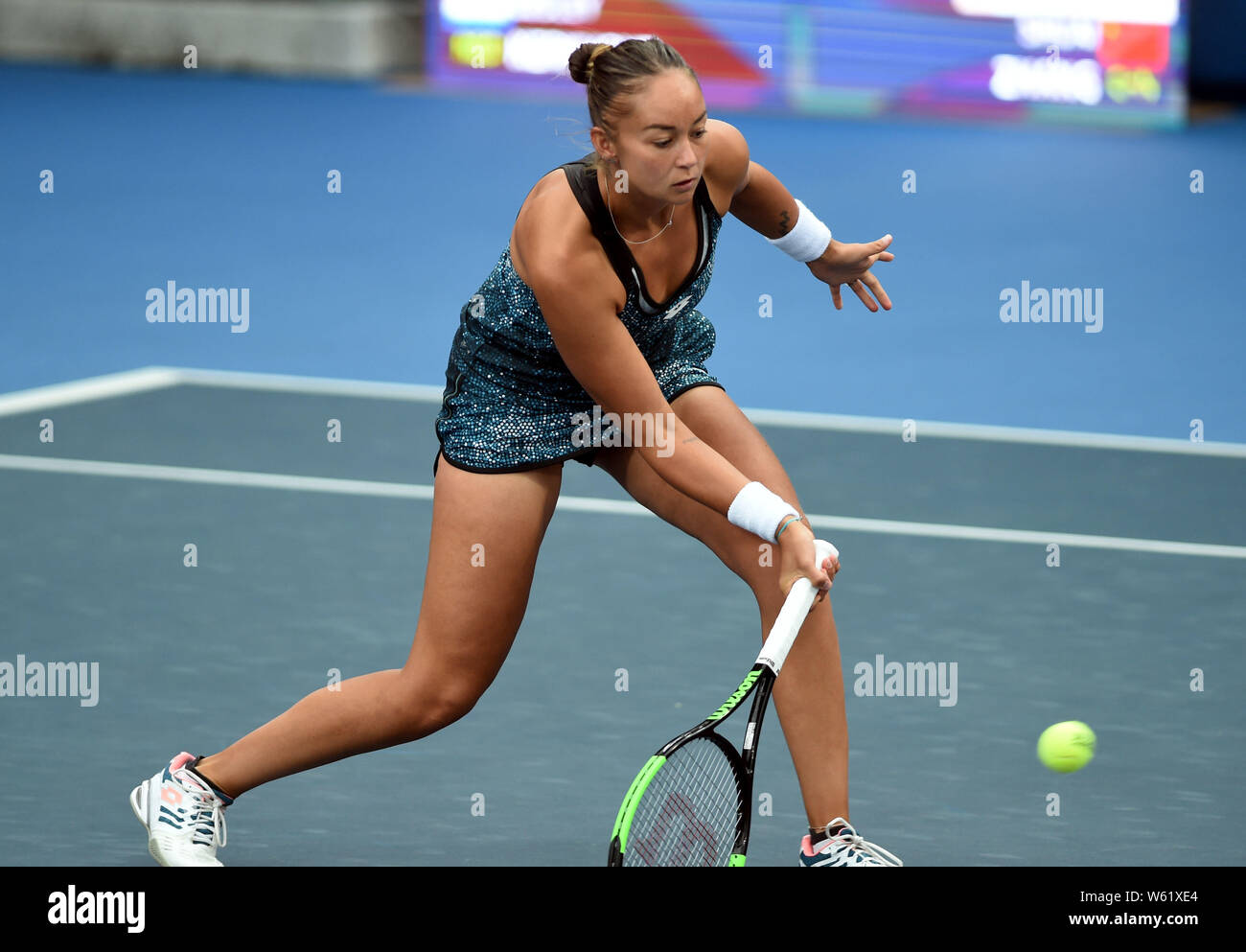 Lesley Kerkhove of Holland returns a shot to Zhang Shuai of China in their  second round match of the women's singles during the WTA Hong Kong Tennis O  Stock Photo - Alamy
