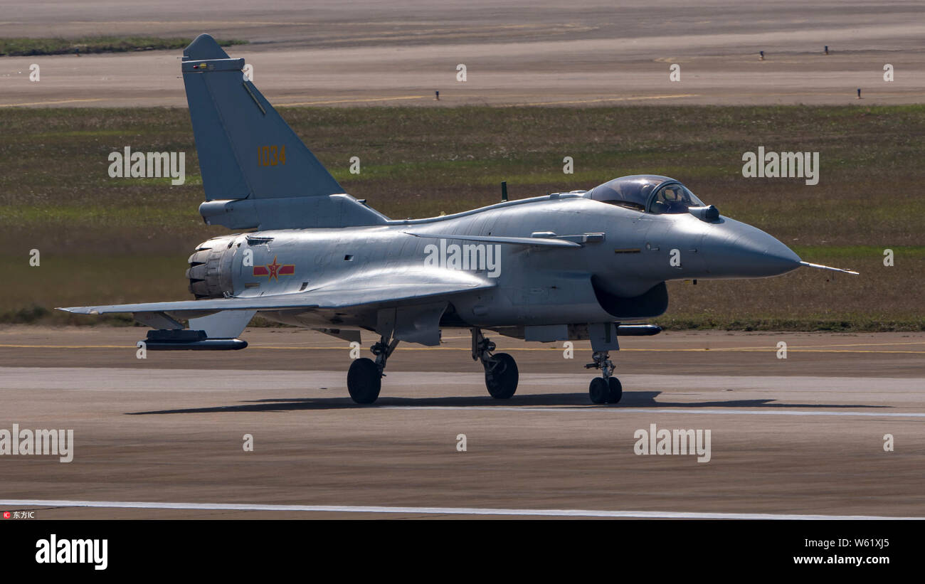 A J-10B fighter jet of the Chinese PLA (People's Liberation Army) Airforce takes part in the first rehearsal training before the 12th China Internatio Stock Photo