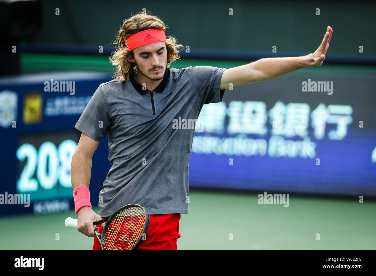 Stefanos Tsitsipas of Greece reacts as he competes against Kevin Anderson  of South Africa in their third round match of the men's singles during the  R Stock Photo - Alamy