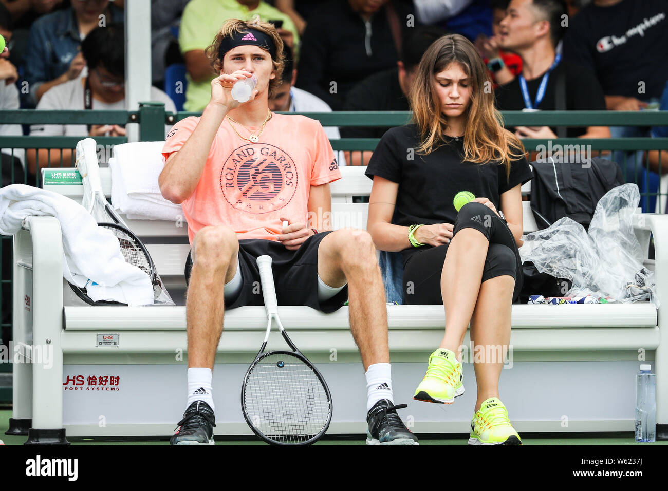 German tennis player Alexander Zverev, left, and his girlfriend take part  in a training session with Swiss tennis star Roger Federer in preparation  fo Stock Photo - Alamy