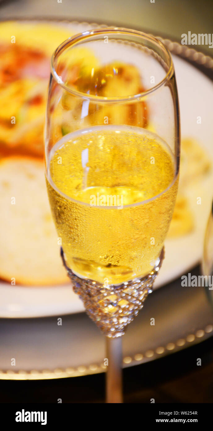 Beautiful champagne cup on a table with a beautiful golden color Stock Photo