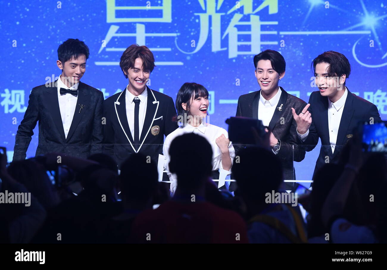 Chinese actor Dylan Wang Hedi, right, of the new lineup of Chinese boy  group F4 and actress Shen Yue attend a press conference for the broadcast  of th Stock Photo - Alamy