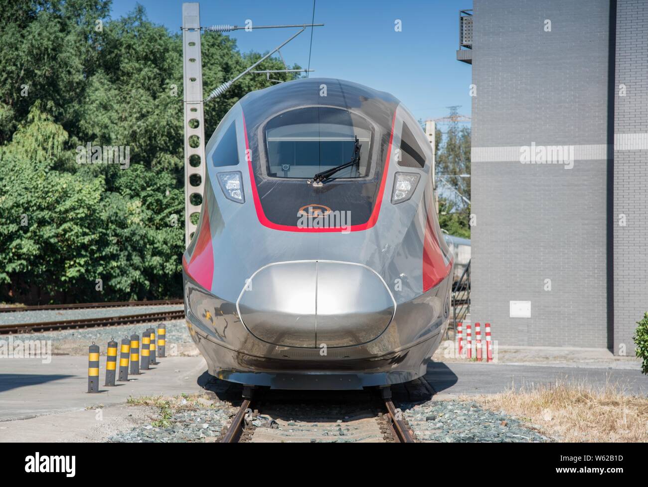 A new longer Fuxing high-speed bullet train, about 440 meters long with 17 cable cars, is seen during a test run at a testing ground in Beijing, China Stock Photo