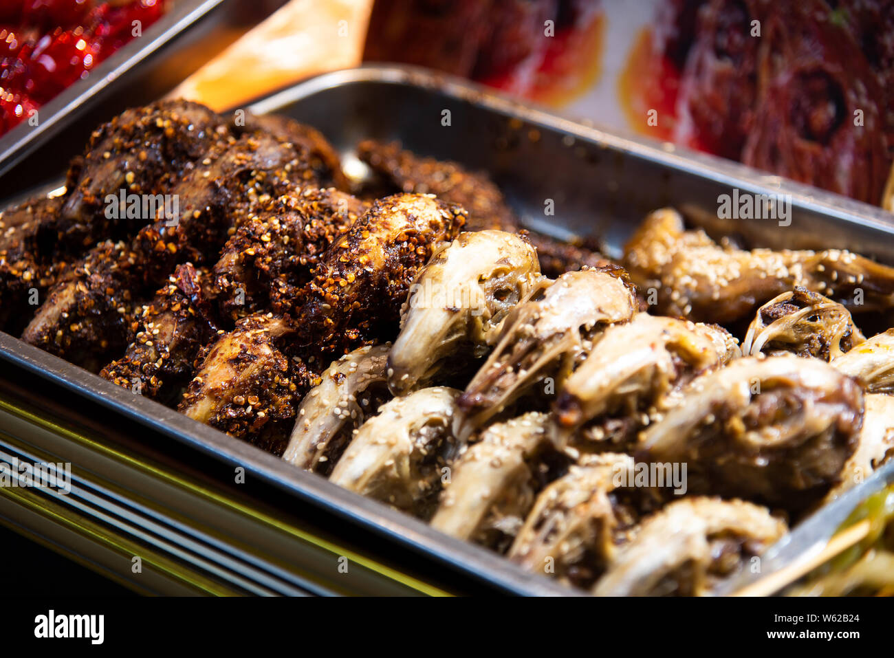 Braised Rabbit head in China food street market Stock Photo