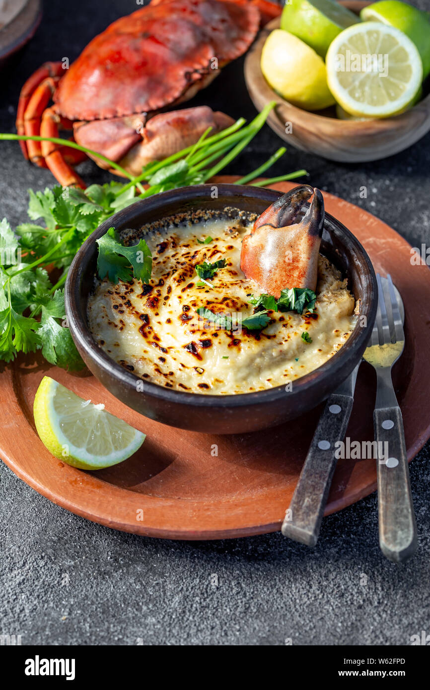 CHILEAN FOOD. Baked crabmeat crab meat with cheese, cream and bread