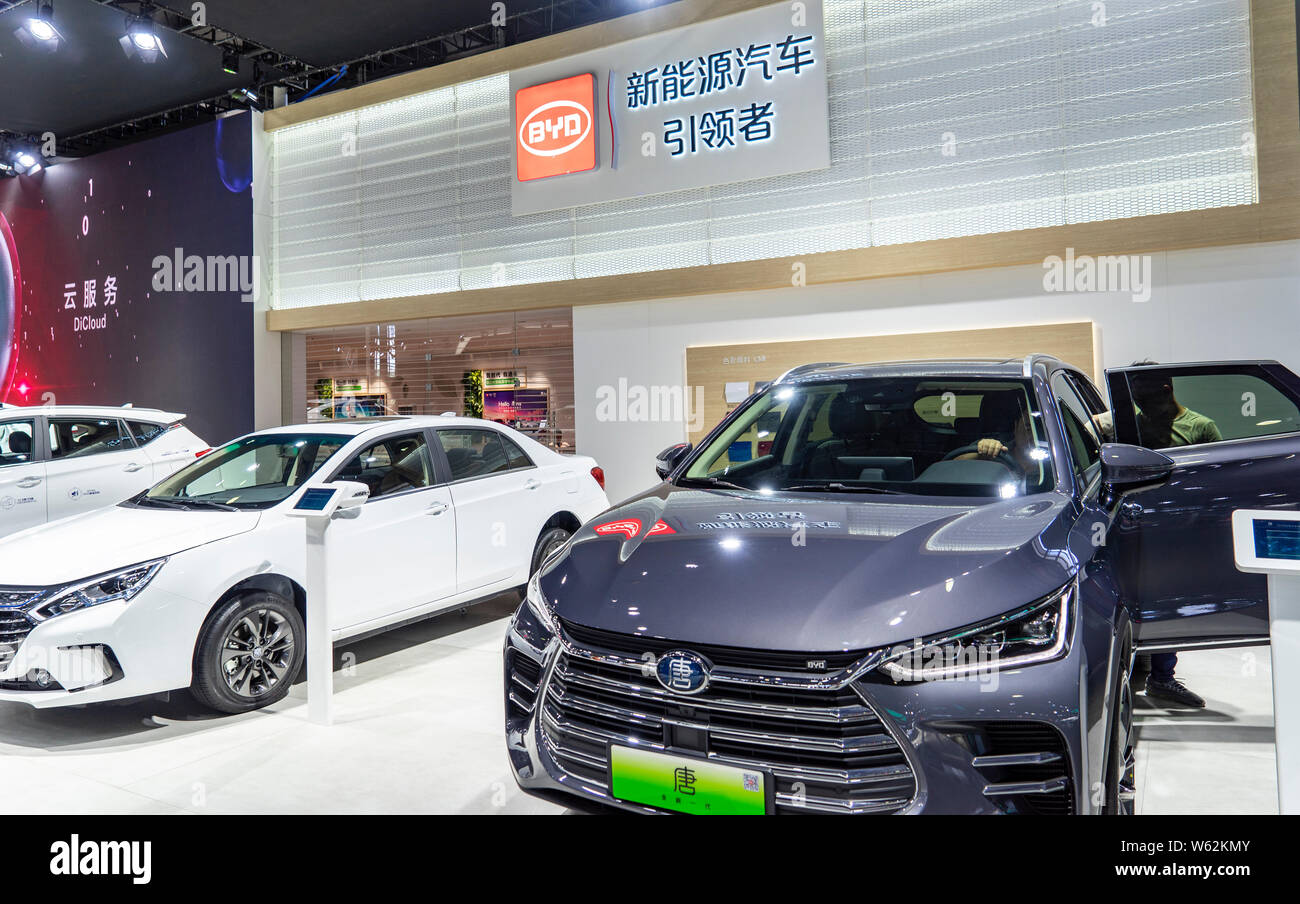 --FILE--Electric vehicles are on display at the stand of BYD during the Shanghai Pudong International Automotive Exhibition 2018 in Shanghai, China, 2 Stock Photo