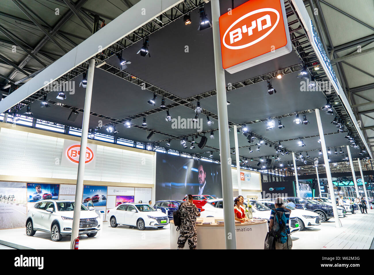 --FILE--People visit the stand of BYD during the Shanghai Pudong International Automotive Exhibition 2018 in Shanghai, China, 28 September 2018.   Chi Stock Photo