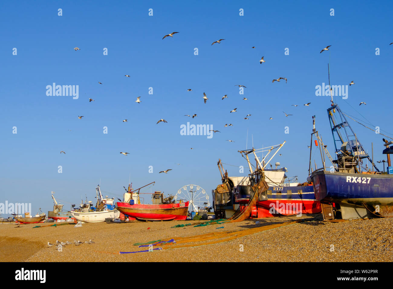 Colourful fishing boats on Hastings Old Town Stade Fishermen's beach, Rock-a-Nore, East Sussex, UK Stock Photo