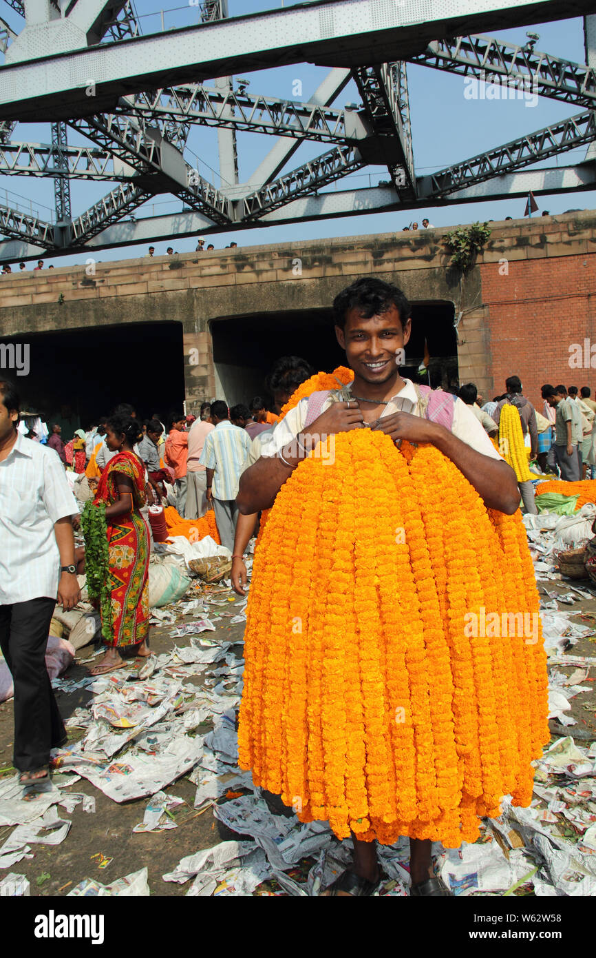 Flower sellers selling garlands at the flower market, Howrah Bridge