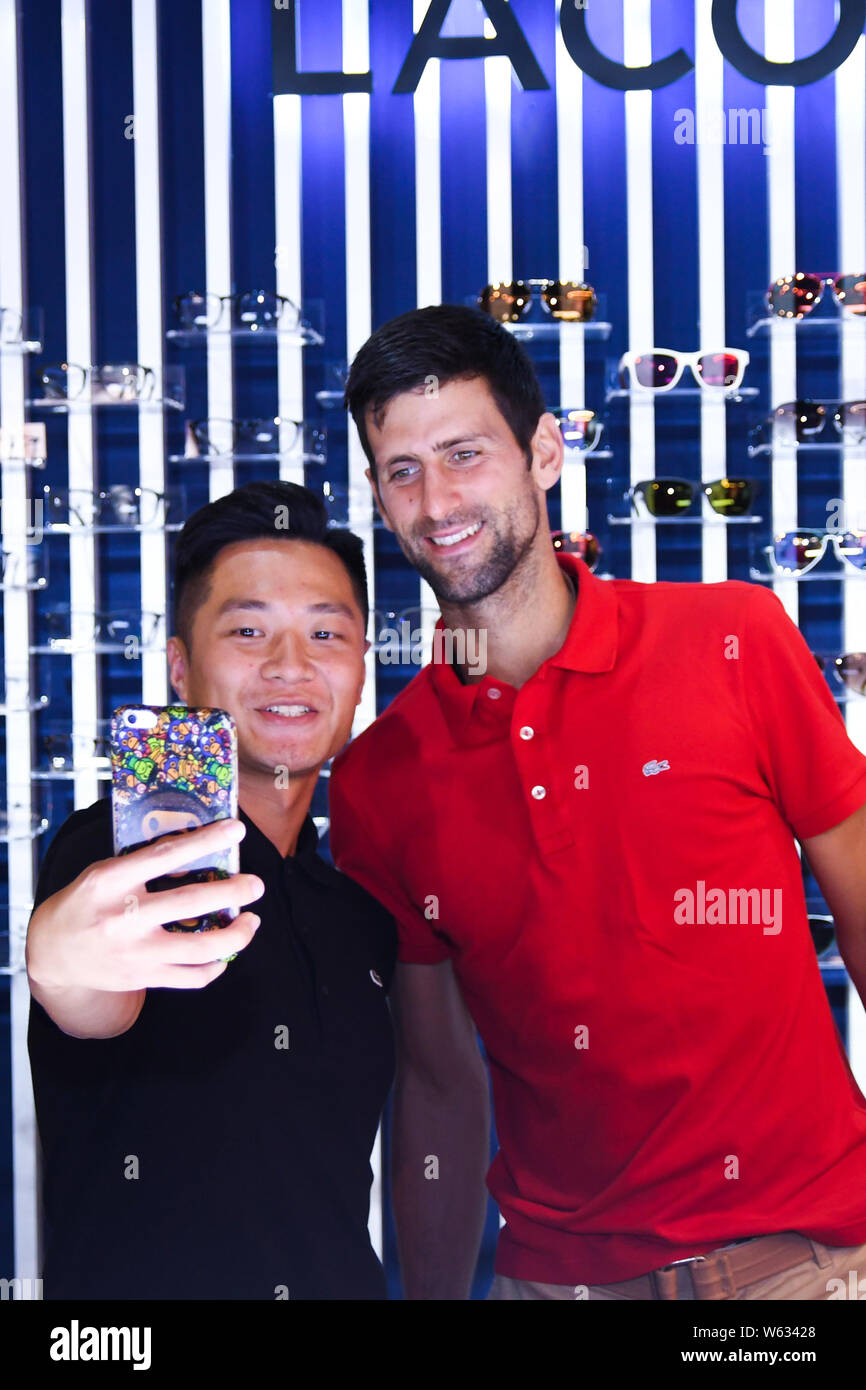 Serbian tennis star Novak Djokovic attends a promotional event by French  fashion brand Lacoste in Shanghai, China, 7 October 2018 Stock Photo - Alamy
