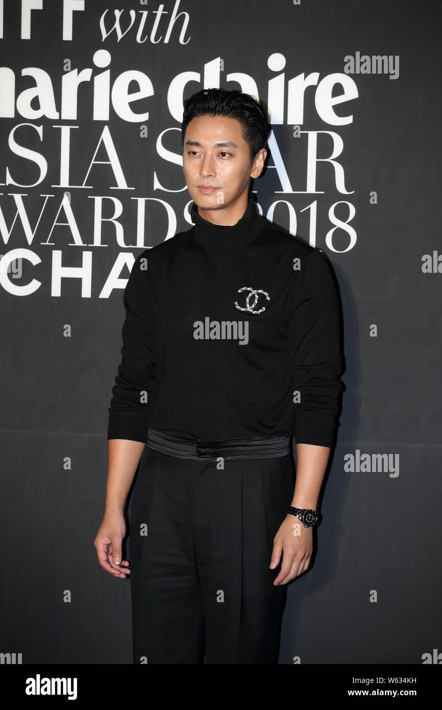 South Korean actor Ju Ji-hoon poses during the Marie Claire Asia Star Awards 2018 in Busan, South Korea, 5 October 2018. Stock Photo