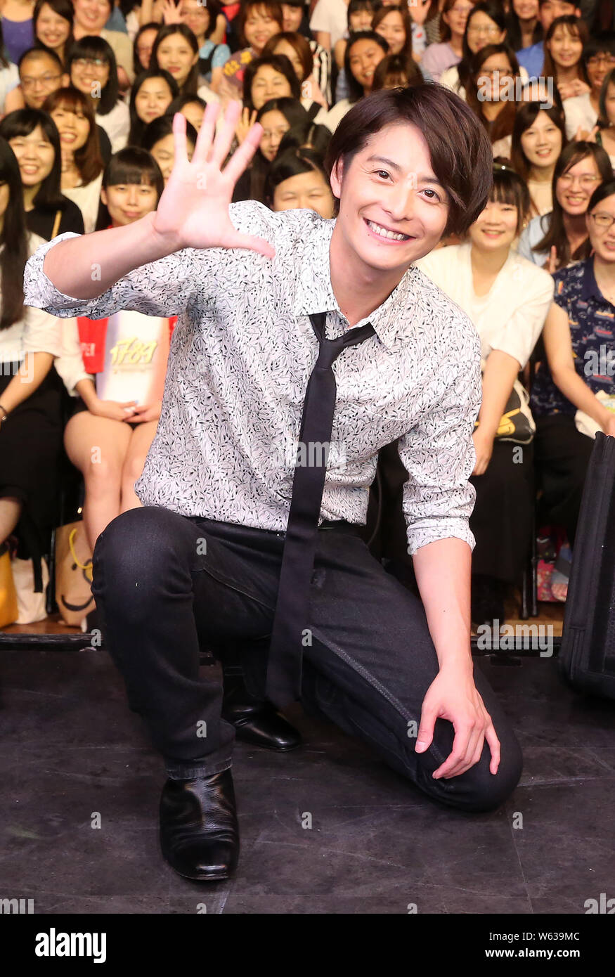 **TAIWAN OUT**Japanese actor and singer Teppei Koike poses for photos with fans during a fan meeting event in Taipei, Taiwan, 2 September 2018. Stock Photo