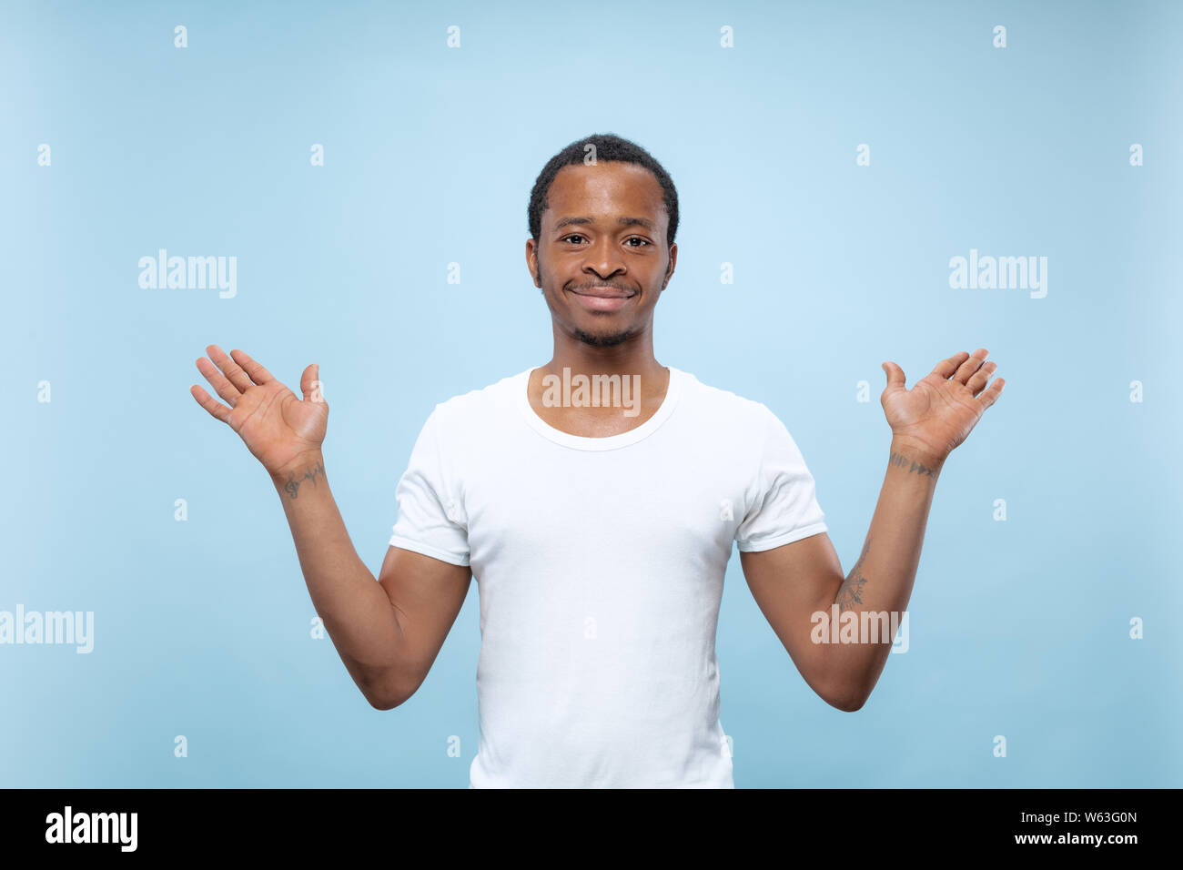 Inviting gesture african man work hi-res stock photography and images ...