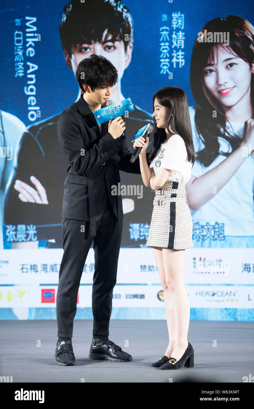 Thai actor and singer Mike D. Angelo of Thai pop duo Golf & Mike, left, and  Chinese singer and actress Ju Jingyi attend a press conference for new TV  Stock Photo -