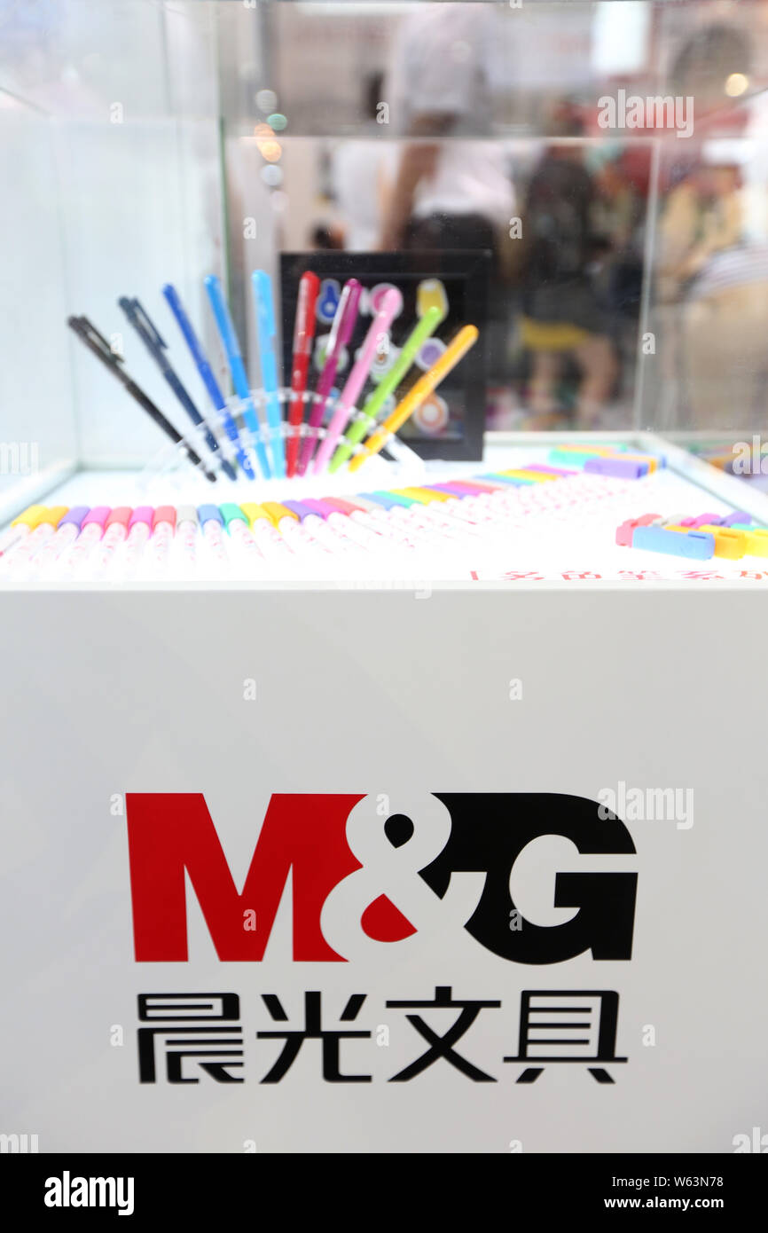 FILEPeople visit the stand of Shanghai M&G Stationery during an