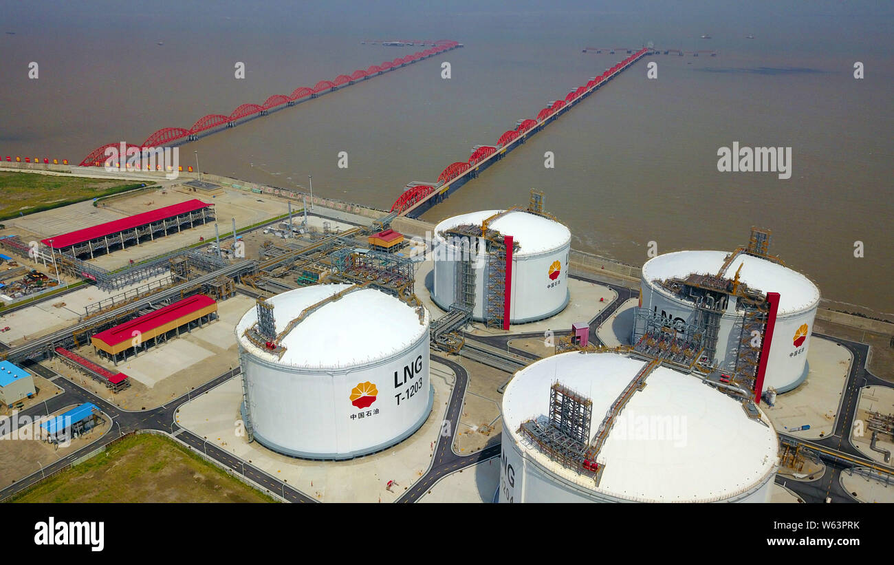 An aerial view of liquefied natural gas (LNG) storage tanks at the Rudong LNG terminal of CNPC (China National Petroleum Corporation), parent company Stock Photo