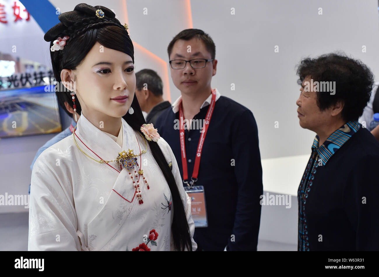 China's first advanced interactive robot Jia Jia interacts with visitors at the 10th Central China Investment and Trade Expo (Central China Expo 2017) Stock Photo