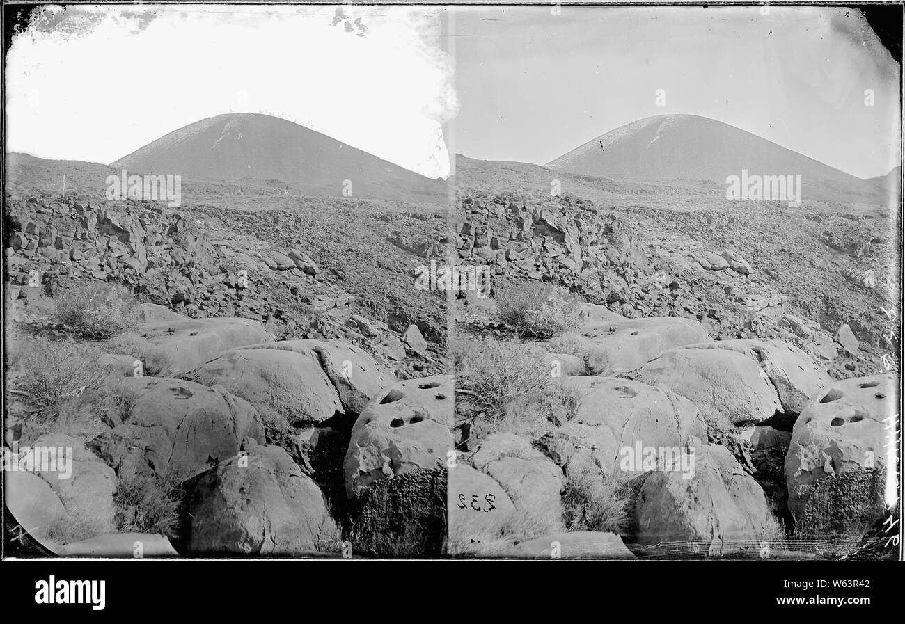 Colorado River. Grand Canyon, the Cinder Cones near foot of Toroweap. The cinder cones on edge of the Grand Canyon at foot of Toroweap is the cone in the upper part of the photo. Old nos. 483, 511, 946. Stock Photo