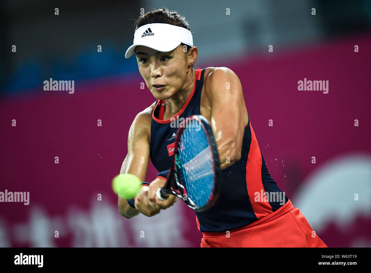 Wang Qiang of China returns a shot to Andrea Petkovic of Germany in their  semifinal match during the WTA Guangzhou International Women's Open 2018 in  Stock Photo - Alamy