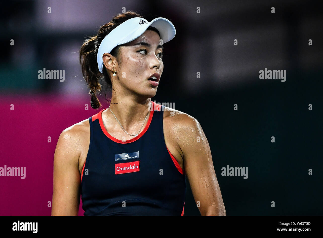 Wang Qiang of China reacts after scoring against Andrea Petkovic of Germany  in their semifinal match during the WTA Guangzhou International Women's Op  Stock Photo - Alamy