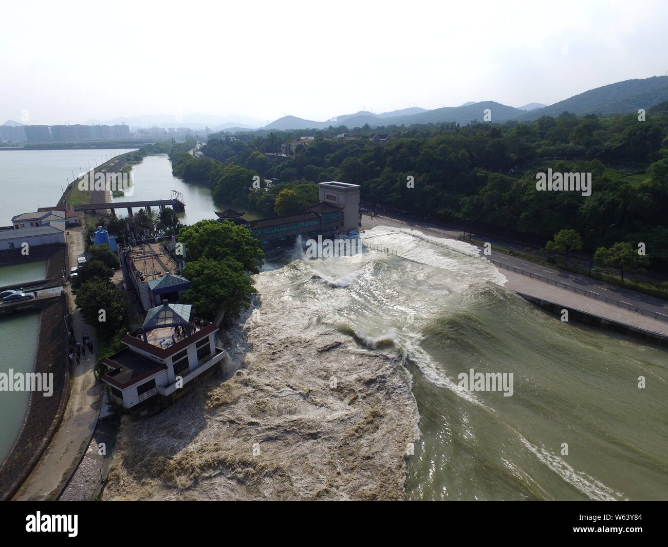 Aerial view of tidal bores from the Qiantang River surging the Shanhusha Reservoir in Hangzhou