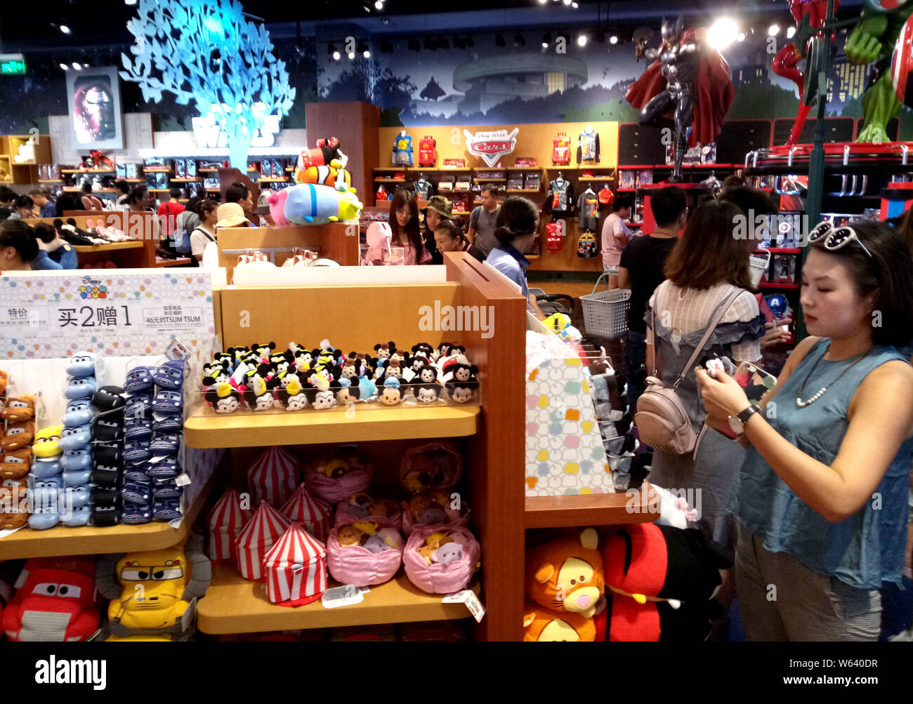 File Customers Shop For Toys Souvenirs And Other Disney Licensed Products At The Flagship Store Of Disney In The Lujiazui Financial District In Pu Stock Photo Alamy
