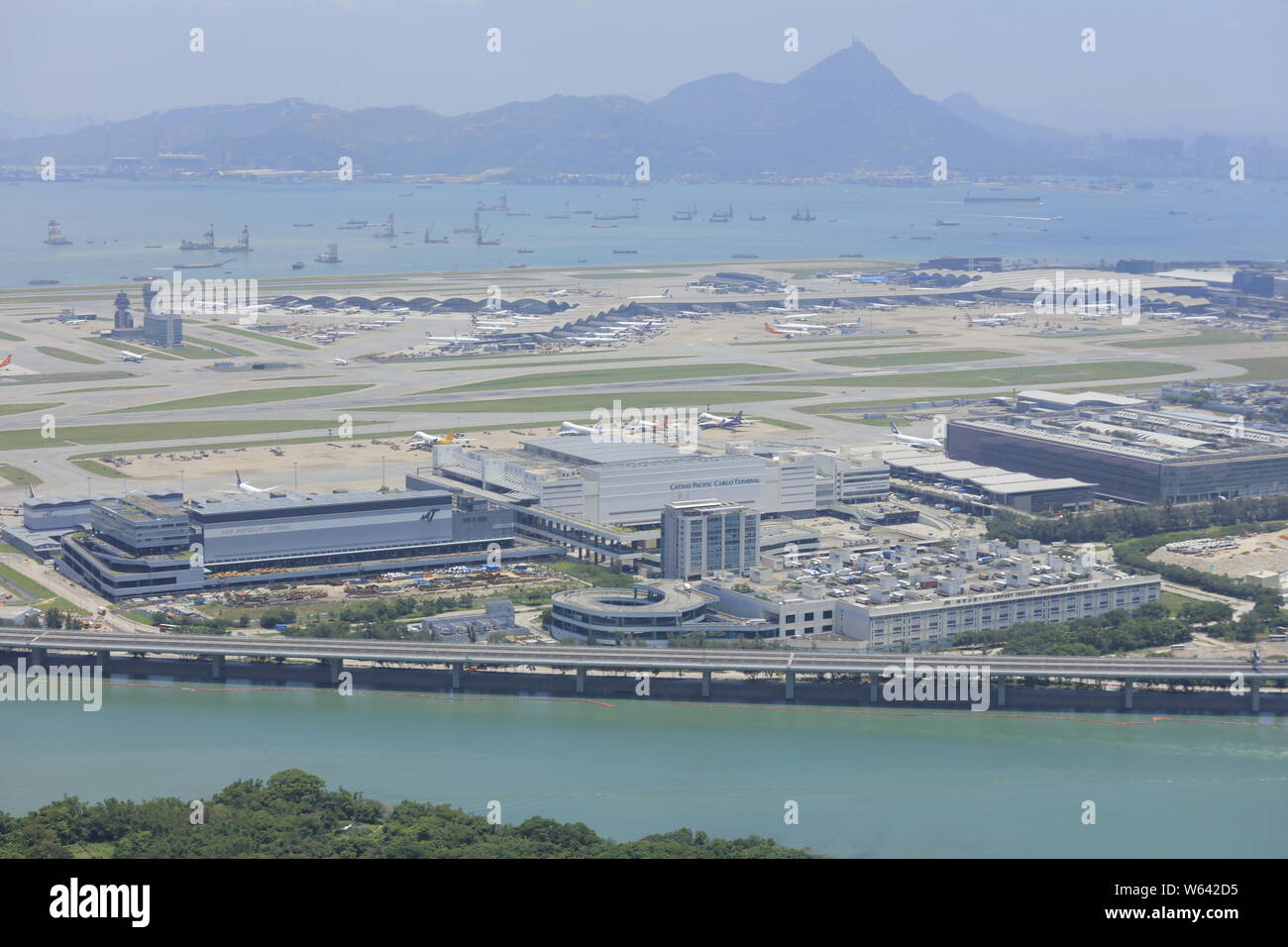 --FILE--An aerial view of the Hong Kong International Airport, colloquially known as Chek Lap Kok Airport, in Hong Kong, China, 17 July 2018.   It was Stock Photo