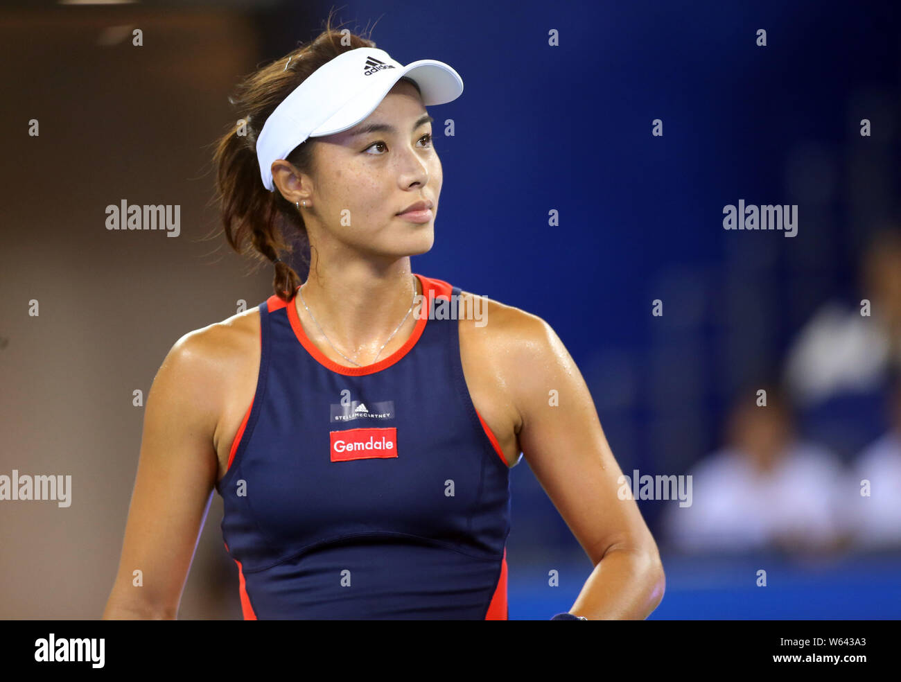 Wang Qiang of China reacts after scoring against Karolina Pliskova of Czech Republic in their second round match during the 2018 Dongfeng Motor WTA Wu Stock Photo