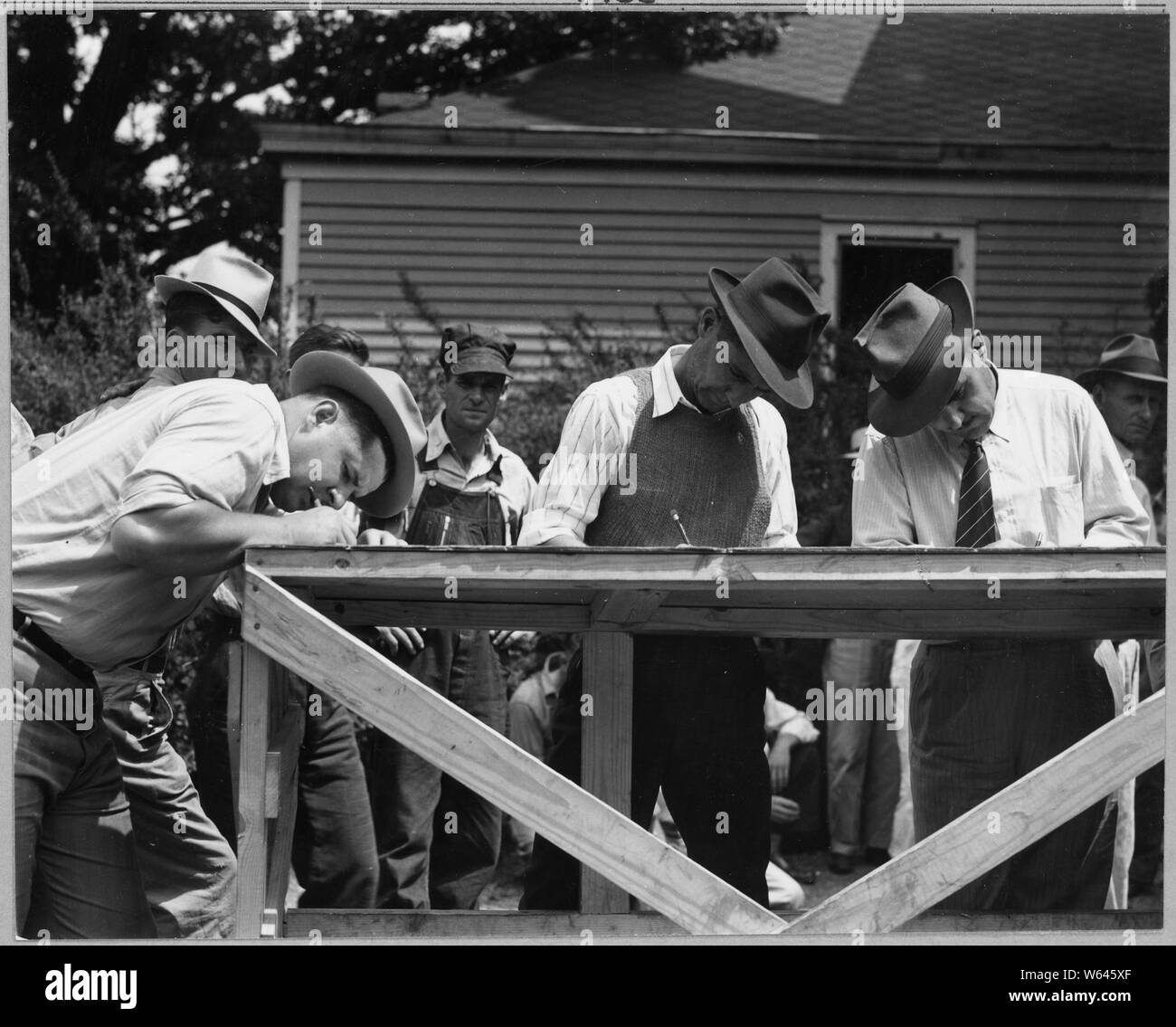 Coosa Valley, Alabama. Employment line outside contractor's office