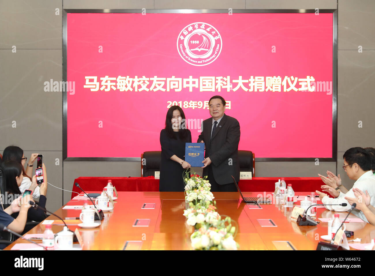Melissa Ma, left, wife of and special assistant to Baidu Chief ...