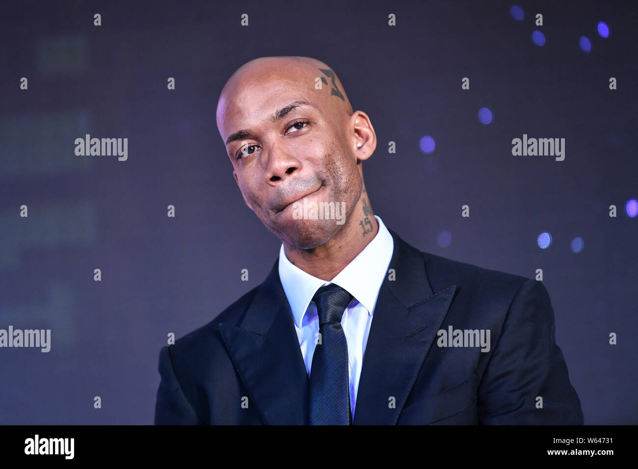 Retired basketball star Stephon Marbury reacts as he speaks to retrospect his career during a promotional event for a limited collection of the watch Stock Photo