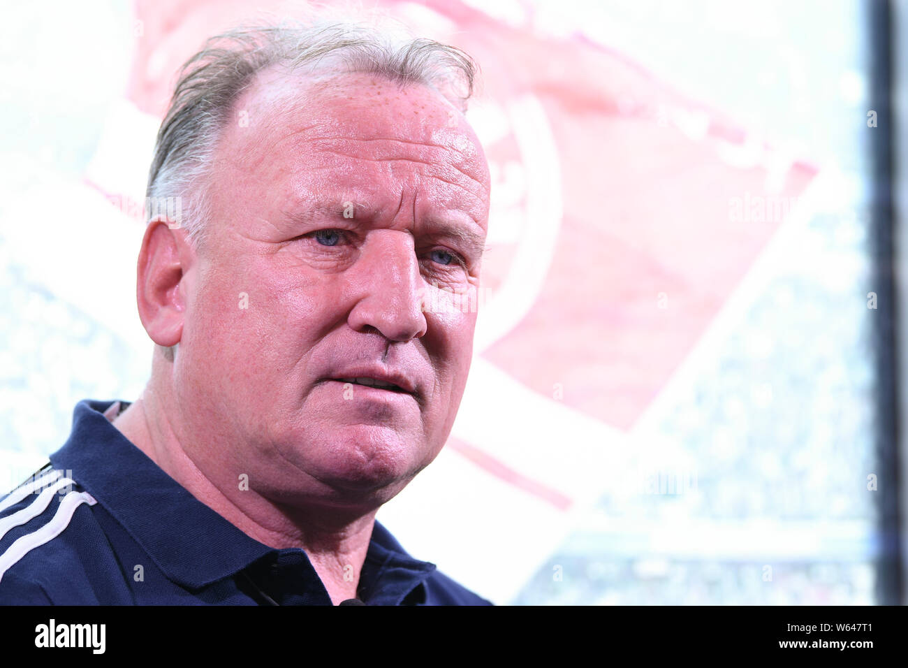 German football coach and former football defender Andreas Brehme visits the FC Bayern office during his China tour in Shanghai, China, 10 September 2 Stock Photo