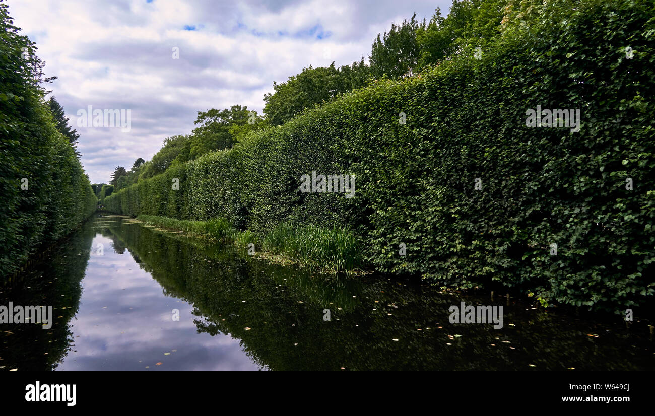 Europe, Poland, Gdansk, Diminishing perspective and reflections over the long pond in Ol Stock Photo