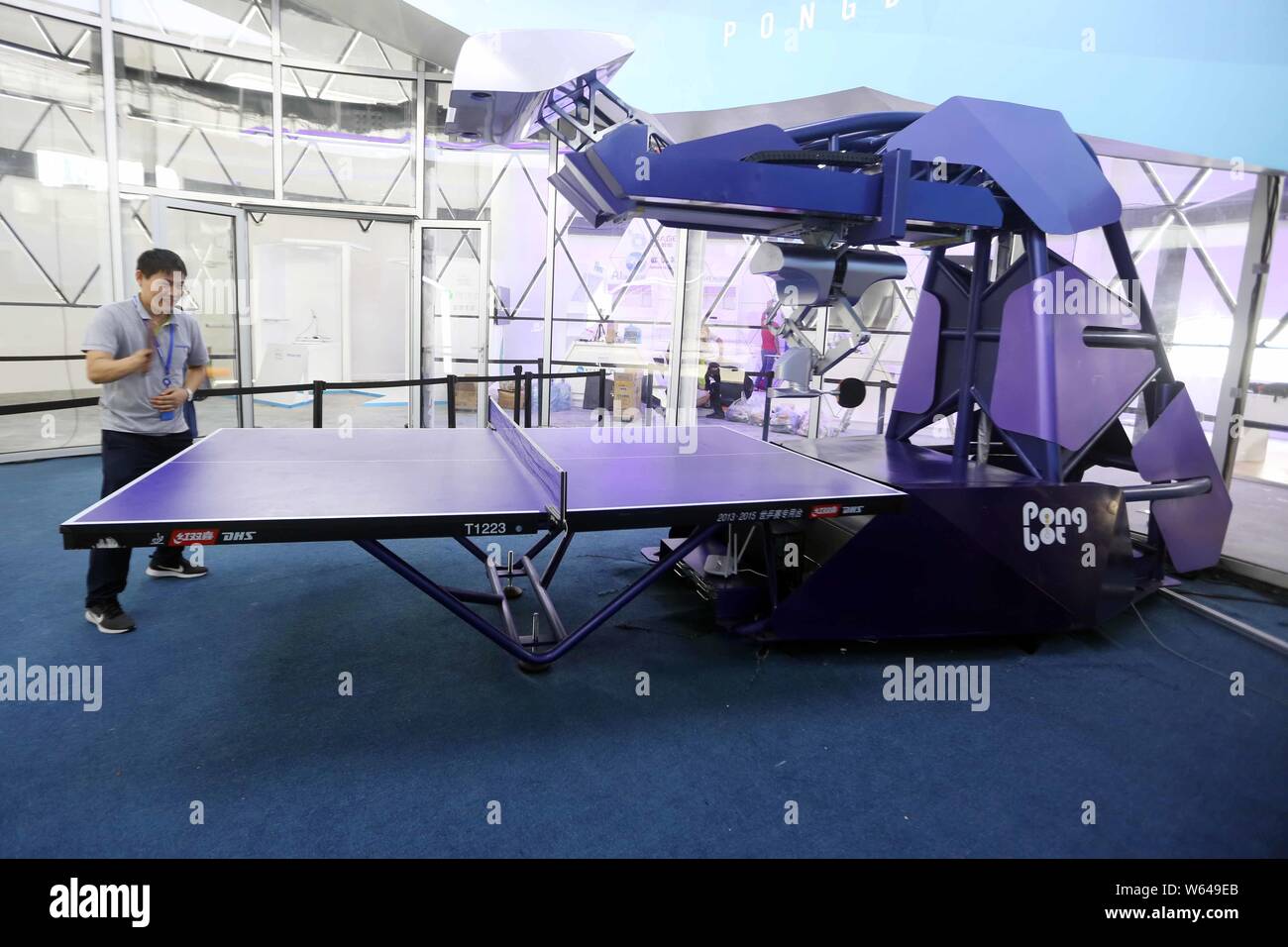 A visitor plays table tennis with SIASUN's Pongbot before the 2018 World  Artificial Intelligence Conference (WAIC) in Shanghai, China, 14 September  20 Stock Photo - Alamy