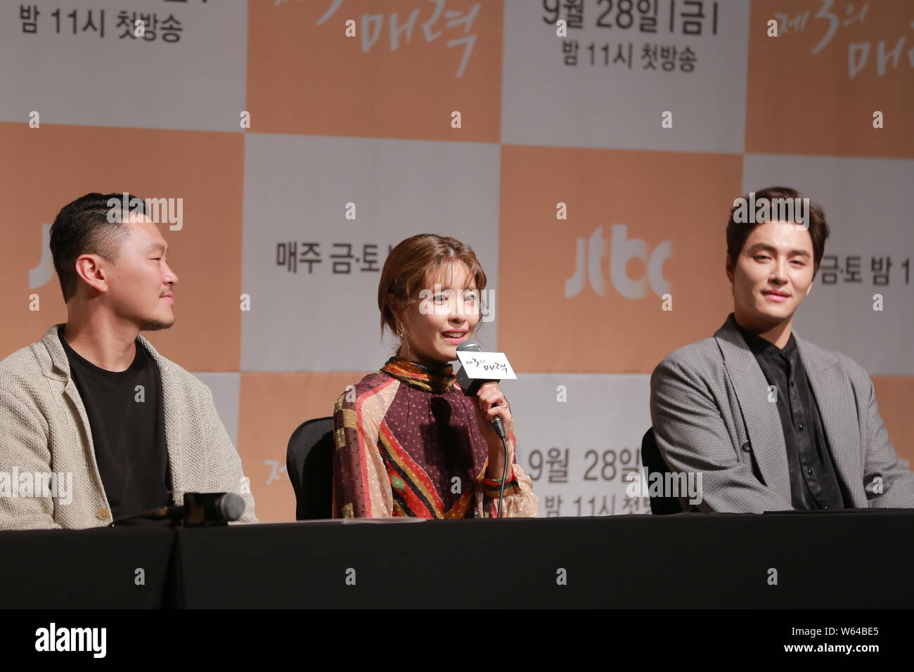 (From left) South Korean actor Yang Dong-geun or YDG, actress Lee Yoon-ji, and actor Min Woo-hyuk, attend a press conference for new TV series 'The Th Stock Photo
