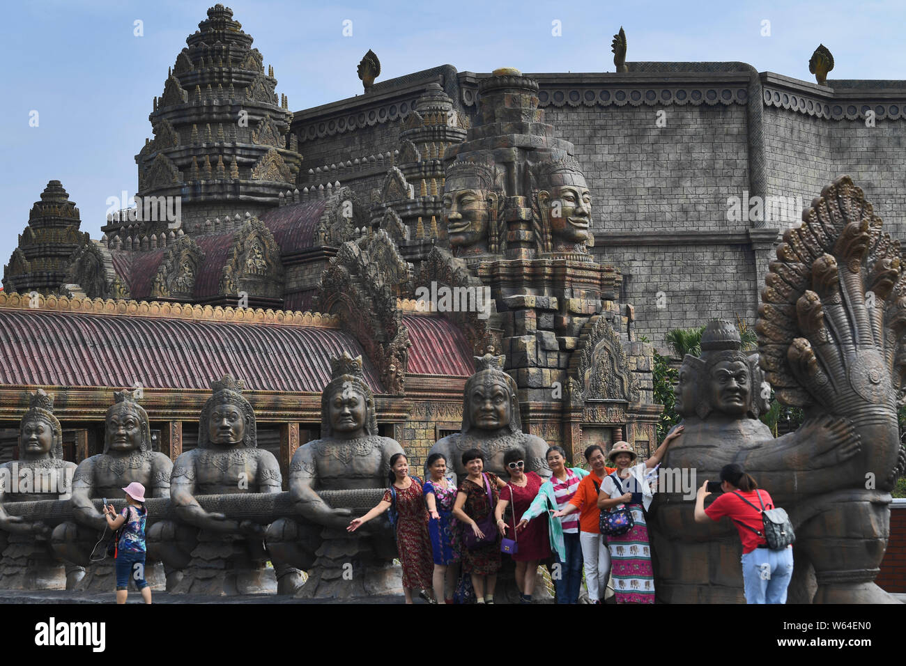 Tourists visit a replica of Cambodia's Angkor Wat temple complex at a tourist attraction in Nanning city, south China's Guangxi Zhuang Autonomous Regi Stock Photo